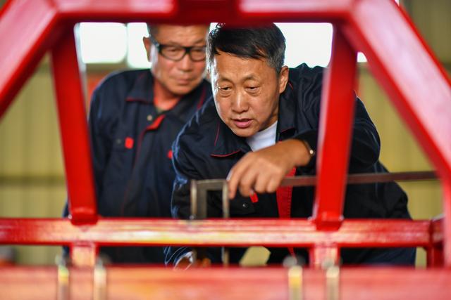 新华全媒+丨我叫建国——“60后”农机研发者的黑土地情结(图8)